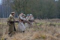 The officer with the soldiers of the white guard army of general Yudenich are put forward on the line of attack. International mil