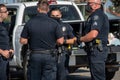 Officers from the City of Ventura Police Department confer at a search of a suspect`s vehicle at Ventura Harbor.