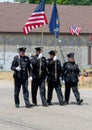 Officers in dress uniform march in a parade Royalty Free Stock Photo
