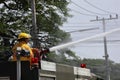 Officers with fire engines extinguishing fires with modern technology 1Jun 66 Nakhon Sawan, Thailand Royalty Free Stock Photo