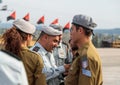 Officers of the IDF reward the soldier with the insignia at the formation in Engineering Corps Fallen Memorial Monument in Mishmar