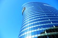 Offices building exterior in summer sunny day. Blue sky had been reflected in the glass of windows. Royalty Free Stock Photo