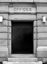 Offices carved stone sign