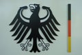 Official Bundeswappen, Bundesadler of Germany with symbolized Bundesflagge Royalty Free Stock Photo