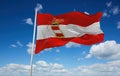 official flag of Austro Hungarian Naval Jack 1894 Austria at cloudy sky background on sunset, panoramic view. Austrian travel and