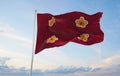 official flag of Naval Standard of the Vice Minister of Defense, Japan at cloudy sky background on sunset, panoramic view.