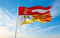 official flag of Province of Liege , Belgium at cloudy sky background on sunset, panoramic view. Belgian travel and patriot