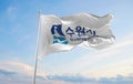 official flag of Suwon city, South Korea at cloudy sky backgroun