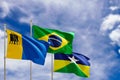 Official flags of the country Brazil, state of Rondonia and city of Porto Velho. Swaying in the wind under the blue sky. 3d