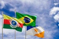 Official flags of the country Brazil, state of Tocantis and city of Araguaina. Swaying in the wind under the blue sky. 3d