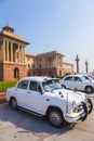 Official Hindustan Ambassador cars park outside North Block, Secretariat Building in Delhi, India