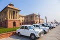 Official Hindustan Ambassador cars park outside North Block, Secretariat Building in Delhi, India