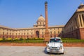 Official Hindustan Ambassador cars park outside North Block, Secretariat Building in Delhi, India