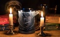 Official House Stark tankard from Game of Thrones series lit by candlelight