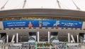 Official images and inscriptions, symbolics and logos of the 2018 FIFA World Cup on a facade of Saint Petersburg Stadium