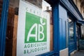 Official logo of Agriculture Biologique, in front of a french supermarket, certifying the shop is selling French Organic Farming