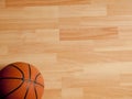 An official orange ball on a basketball court