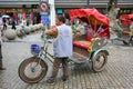 Pedal taxi driver waiting for business