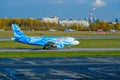 Official Zenit football club Rossiya airlines company airplane preparing for take-off at Pulkovo airport runway