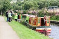 Officials check narrowboats in preparation for transiting the Stanedge tunnel on the Huddersfield Narrow Canal, Diggle, Oldham, Royalty Free Stock Photo