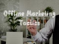 Offline Marketing Tactics phrase on the piece of paper Royalty Free Stock Photo