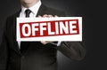 Offline sign is held by businessman