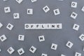 Offline word made of square letter word on grey background