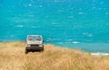 An offroad adventure background - suv car sea