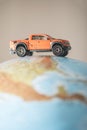 Offroad car on globe Royalty Free Stock Photo