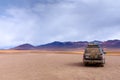 Offroad car parked in a desert Royalty Free Stock Photo