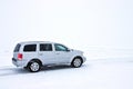 Offroad Car on the Snowy Road