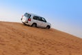 Offroad Desert Safari - Dune bashing with 4x4 vehicle in the Arabian sand dunes, Dubai, UAE Royalty Free Stock Photo
