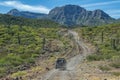 Jeep car in baja california landscape panorama desert road with cortez sea on background Royalty Free Stock Photo