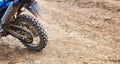 Offroad mountain motorcycle or bike taking part in motocros competition parked on dirty terrain road