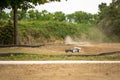 Offroad RC buggy driving on an outdoor dirt track Royalty Free Stock Photo