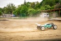 Offroad RC buggy driving on an outdoor dirt track Royalty Free Stock Photo