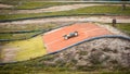 Offroad RC buggy driving on an outdoor dirt track Royalty Free Stock Photo