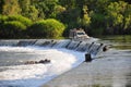 Offroad truck driving the Ivanhoe Crossing, Kununurra, Western Australia, Australia. A concrete causeway over Ord River Royalty Free Stock Photo