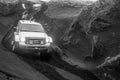 offroad vehicle driving through extreme terrain in Iceland