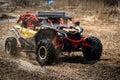 Offroad vehicle makes splashes of dirty water at sunny day Royalty Free Stock Photo