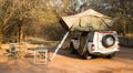 Offroad 4x4 vehicle with tent in the roof Royalty Free Stock Photo