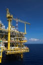 Offshore construction platform for production oil and gas, Oil and gas industry and hard work, Production platform and operation Royalty Free Stock Photo