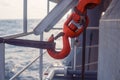 Offshore crane hook is secured for sea passage.