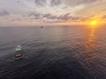 Offshore crew boat sunset