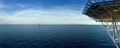 Panorama of offshore drilling rig with supply boat