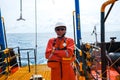 Offshore engineer, standing on the deck of an industrial ship Royalty Free Stock Photo