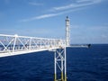 Offshore Flare stack of Gas Flare system on clouds in the blue sky background Royalty Free Stock Photo