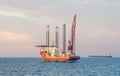 Offshore jack-up barge and an oil tanker Royalty Free Stock Photo