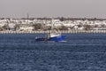 Offshore lobster boat Direction and New Bedford skyline Royalty Free Stock Photo