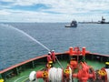 Offshore marine crew doing an emergency fire drill onboard offshore marine vessel. Fire drill is mandatory requirement under SOLAS